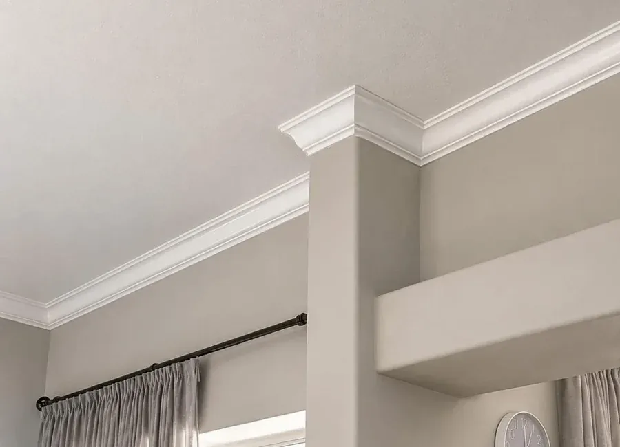 Room with new crown molding and baseboards