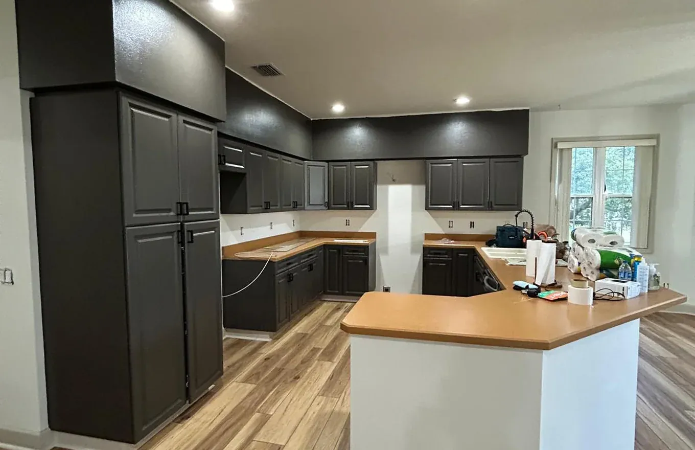 Open-plan living space with fresh plank flooring